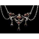 Edwardian necklace, set with round cut garnets and seed pearls, integrated belcher link chain,