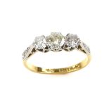 Three stone diamond ring, three round brilliant cut diamonds, estimated total weight 0.80 carats,