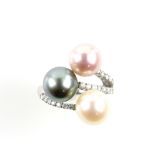 Triple colour pearl and diamond ring, in fluid form, stamped '750' for 18 ct white gold, ring size