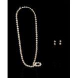Pearl and diamond necklace; single strand of pearls with adjustable diamond set clasp and diamond