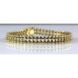 Modern double row diamond bracelet, rub over set with round brilliant cut diamonds, estimated