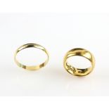 Two wedding bands, one in 22 ct gold, ring size I, and another 18 ct ring size R . CONDITION18 ct