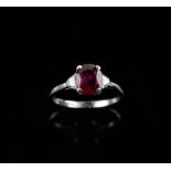 Burmese ruby and diamond ring, the ruby of 1.80 carat, set with two trapeze cut diamonds, set in