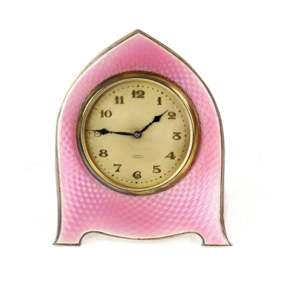 George V silver and pink enamel alarm clock, the shield-shaped body with pink enamel front, maker'