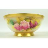 Royal Worcester bowl painted with roses, signed M Hunt, factory marks for 1932 to base, diameter