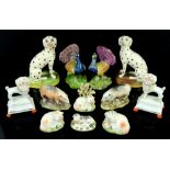 Pair of 19th century Staffordshire models of pigs and other Staffordshire animals, (12). Dalmatians: