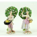 Pair of 19th century Staffordshire figures of a man and a woman by flowering shrubs, 13cm . Please