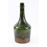 Vintage green glass Benedictine bottle, partial label, 40cm high, no contents .