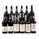 Twelve bottles of port to include one bottle of Croft 1963 vintage port, one bottle of Warre's