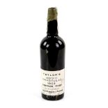 A bottle of Taylors Quinta da Vargellas 1969 Vintage Port .