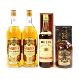 Chivas Regal 12 year old blended whisky 75 cl, along with Bells 75cl, and two bottles of Grants