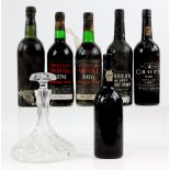 Six bottles of port to include: one bottle of Warre's 1977 vintage (lacking label), two bottles of