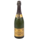 One bottle of Veuve Cliquot Ponsardin Brut Champagne, 1964 vintage .