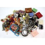 Large group of costume jewellery, including bead necklaces, faux pearls, bangles, brooches and other