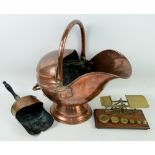 Copper helmet shaped coal scuttle a scoop and set of postal scales.