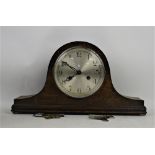 Early 20th century oak twin-train mantel clock and another clock.