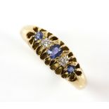 Edwardian sapphire and diamond ring, a bloodstone set signet ring, both 18 ct, wedding band and