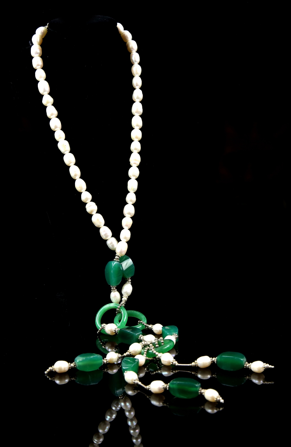 Flapper girl style pendant necklace of pearls green chalcedony and silver .