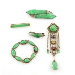 A group of mounted jadeite items, including bar brooch, mount testing as 14 ct, 5 x 1cm, another set