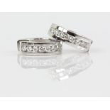 Contemporary channel set diamond hoops, estimated total diamond weight 0.50 carats, mounted in 18 ct
