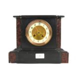 Vienna type wall clock and a black slate and red marble mantel clock,.