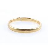 Gold tubular bangle, swing function to open concealed clasp, testing as 9 ct. CONDITIONGross weight