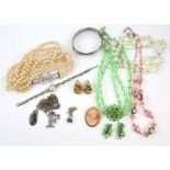 Group of silver and costume jewellery including a silver bangle, cameo pendant brooch with marks for