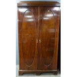 Early 20th century mahogany double wardrobe converted from a triple wardrobe . Width 105cm