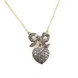Antique rose cut diamond heart and bow pendant, mounted in silver, 2.2 x 1.6cm, on integrated