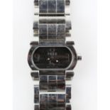 Fred rectangular cased watch the signed black dial with silvered Arabic numeral hour markers to 12,