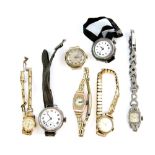 A group of wrist watches, one MuDu in 18 ct gold case, a Tissot with expanding strap in 9 ct and two