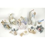 Lladro figural group 5486 Debutantes, Lladro figural group two poodles and a ball, and various Nao