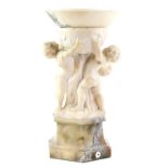 19th Century carved marble font base in the form of three putti on octagonal base - 50 cm high .