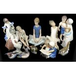 Bing and Grondahl, Lladro and Nao figurines to include children reading, birds, ballerina 1358 and