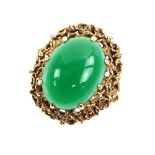 Vintage green stone cocktail ring, mount testing as 14 ct, ring size L. CONDITION14 ct gross