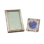 Two silver photo frames one with Lily Art Nouveau design Chester, 1903 and other Birmingham 1959.