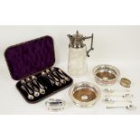 Cased set of twelve Victorian silver teaspoons and sugar nips, four silver teaspoons, silver