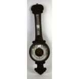 Early 20th century carved oak barometer.