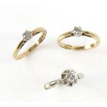 Three diamond single stone rings, one set in white metal with French eagle mark for 18 ct gold, ring