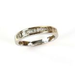 Diamond half eternity ring, channel set baguette cut diamonds, mounted in 18 ct white gold, ring