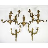 Set of three brass twin branch wall lights with scroll arms, and two pairs of brass twin branch wall