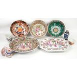 A quantity of oriental ceramics including three large bowls, cups and a porcelain rabbit in the