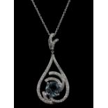 Aquamarines and diamond pendant, centrally set with a round cut aquamarine, mounted in 18 ct diamond