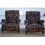 Pair of 19th century reclining armchairs on turned mahogany supports,.
