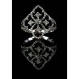 Diamond open work quatrefoil ring, set with round brilliant cut diamonds, estimated total diamond
