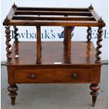 19th century walnut Canterbury, with three sections on turned supports,.