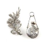 Victorian silver scent bottle pendant with repousse floral decoration and a later articulated