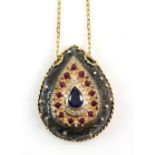 Sapphire, ruby and diamond pendant, set in a pear shape motif, mount stamped 18 ct, 3 x 2.5cm, on