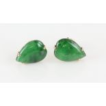 A pair of nephrite jade earrings, pear cabochon cut jade, claw set in gold stamped 14 ct, post and