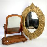 Gilded wood frame wall mirror decorated with fruiting vines, cheval mirror and a dressing table